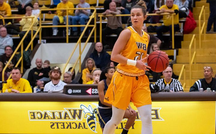 Image of Woman Playing Basketball